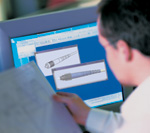 Engineer At Workstation Image