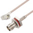 Picture of SMA Male Right Angle to TNC Female Bulkhead Cable Assembly using RG316 Coax, 3 FT
